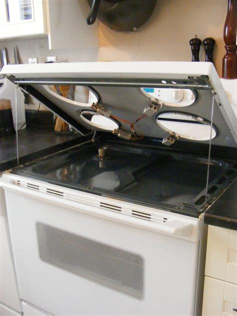 how to clean under gas oven